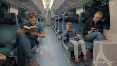 一家三口在深夜乘坐特快列车旅行，妈妈和儿子忙着玩手机和平板电脑