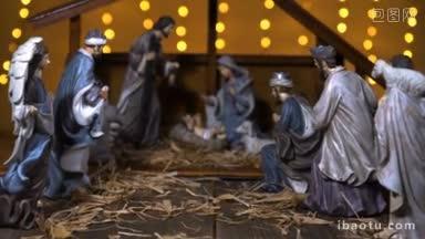 耶稣基督的诞生场景与大气灯光耶稣基督出生在马厩与玛丽和约瑟夫的人物