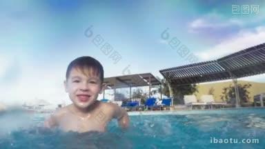 慢镜头里，快乐的小孩在游泳池里玩得很开心，他笑着，溅着<strong>水</strong>