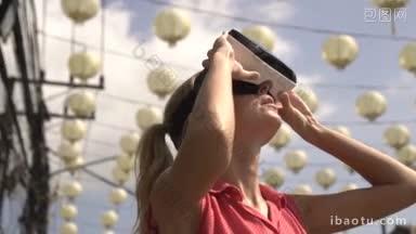 特写画像的妇女有乐趣与虚拟现实眼镜在中国灯和美丽的夏天天空树视频