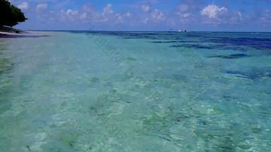 温暖的旅游异国情调的旅游海滩旅行蓝色的海明亮的桑迪背景日落