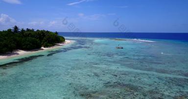 热带空中旅游拍摄白色桑迪天堂海滩蓝色的水背景质量