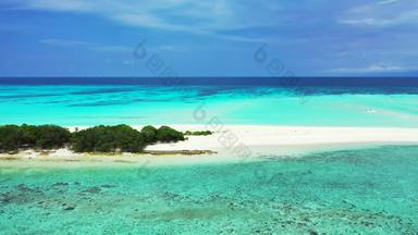 热带摘要视图夏天白色天堂沙子海滩蓝色的水背景色彩鲜艳的