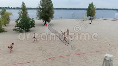 沙滩排球比赛的空中镜头，背景是河流，4k