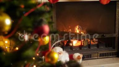 在为庆祝圣诞节或新年而装饰的客厅壁炉里燃烧的木头的4K镜头。 完美完美完美