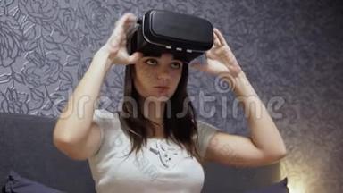 美丽的年轻女子穿着VR耳机在卧室。 四处看看。 特写观看VR视频，播放VR游戏..
