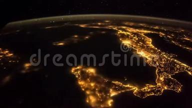 来自国际空间站的地球和意大利。 这段视频的元素由美国宇航局提供。 意大利点亮了夜灯
