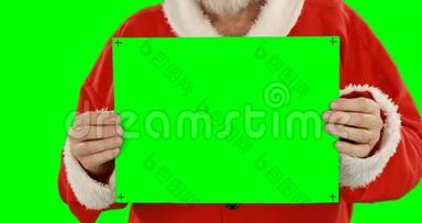 圣诞老人的中间部分拿着空白标语牌