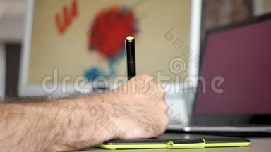 数码艺术家平面设计师在他的数码平板电脑绘图