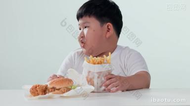 小胖男孩吃快餐油炸食品4K分辨率清晰实拍