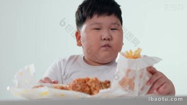 小胖男孩吃快餐不健康食物高清实拍