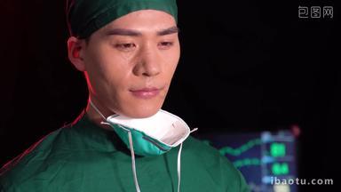 身着手术服的青年男医生手术室表现积极高清视频