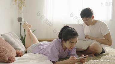 年轻情侣玩游戏女朋友放松场景拍摄