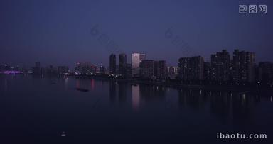 城市夜晚江边建筑航拍