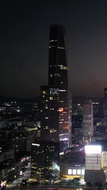航拍广东东莞国贸中心夜景灯光竖版