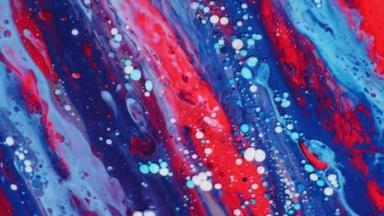 色彩艳丽的油画宇宙色彩斑斓，五彩斑斓。丙烯酸涂料。神奇的催眠面。色彩艳丽的油漆变形结构气泡