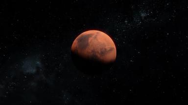 在拍摄火星飞行的过程中，以恒星为背景，穿过了太空。3D 4k火星红行星可视化放大