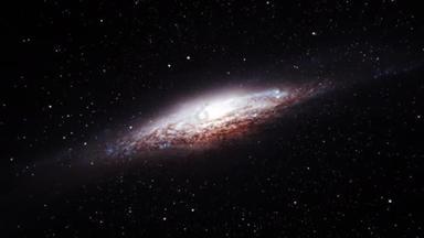 无缝线环路太空探索在外层空间命名为NGC 2683或UFO星系的边缘螺旋形星系位于林克斯星座与移动的星场。4K 3D 。包含NASA的公共图像.