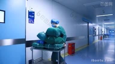 4K医疗_ 实拍护士将无菌用具推到手术室