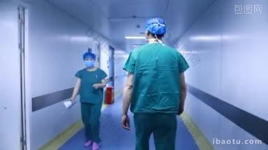 4K医疗_ 实拍医生穿过走廊走进手术室