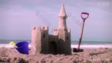 沙滩沙滩城堡和玩具与夏季海滨度假伟大的主题海滩