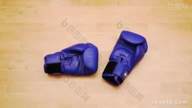 拳击手套被扔在地板上接受挑战的象征