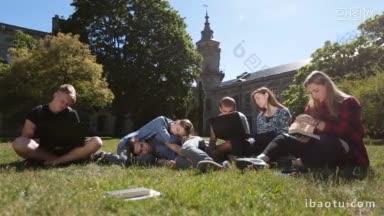 一群过度劳累的<strong>大学生</strong>在大学校园的草地上努力学习，疲惫的同学在公园的草坪上一起学习，同时准备