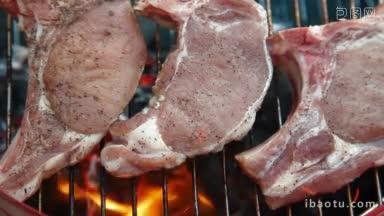 烧烤架上的烤猪肉排特写