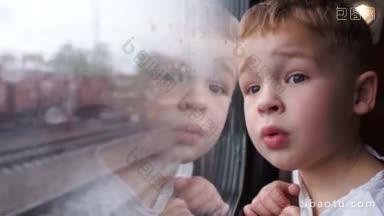 一个好奇的小男孩在火车上向窗外看的特写镜头。外面正在下雨