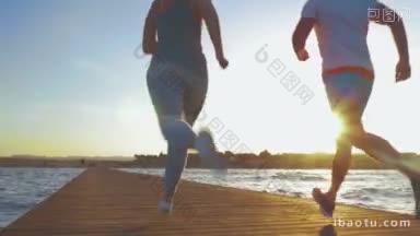 斯坦尼康拍摄的年轻夫妇结束了他们的晨跑，他们正在跑转身对着<strong>相机</strong>