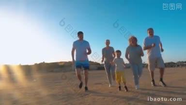 斯坦尼康慢动作拍摄的一个大的家庭慢跑在早上小男孩是跑在前面