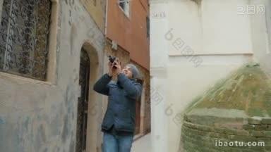 慢动作斯坦尼康<strong>拍摄</strong>的一个年轻人走在古老的旧建筑在威尼斯和射击外部与<strong>复古</strong>
