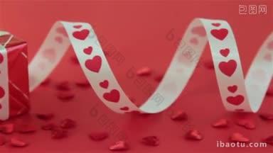 红玫瑰和巧克力糖果配<strong>蜡烛</strong>，情人节的爱和浪漫的概念