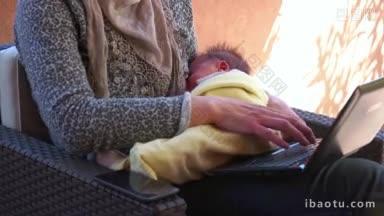 忙着工作的女人给刚出生的婴儿喂奶，<strong>一心</strong>多用的妈妈在工作