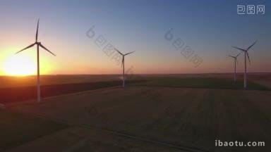 日落时风力发电场的大型风力<strong>涡轮机</strong>的鸟瞰图，可生产可持续和可再生能源