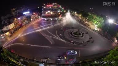 时间推移高和广角拍摄交通交通中心城市广场上的喷泉在河内的夜晚