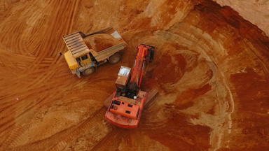 挖掘机加载矿业卡车沙子采石场沙子矿业行业