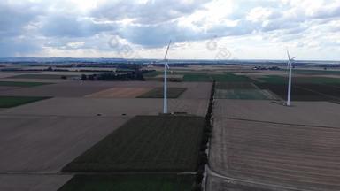 风权力涡轮机生成清洁可再生能源可持续发展的发展空中视图风涡轮机替代能源production-aerial拍摄日落无人机
