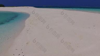 关闭旅游热带旅游海滩生活方式蓝色的环礁湖白色沙子背景手掌