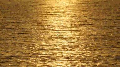 闪闪发光的阳光平静水金闪耀阳光反映了日落海表面自然背光相机编解码器