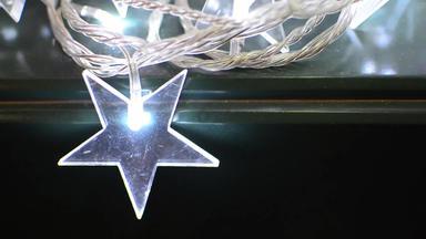 发光的圣诞节明星饰品股票视频完全loopable明星饰品闪闪发光的发光的晚上光