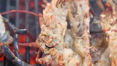 蓝色的布列塔尼人龙虾海鲜市场布列塔尼烧烤蒸烹饪烧烤食物背景龙虾烹饪烧烤火烧烤