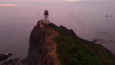 视图飞行<strong>矿石</strong>布林灯塔站纯粹的悬崖背景蓝色的海明亮的黎明