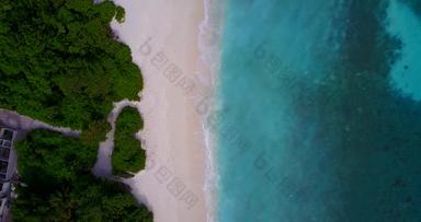 奢侈品飞行清洁视图白色沙子天堂海滩阿卡蓝色的水背景