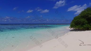 空摘要美丽的海岸海滩野生动物蓝色的环礁湖白色桑迪背景日出
