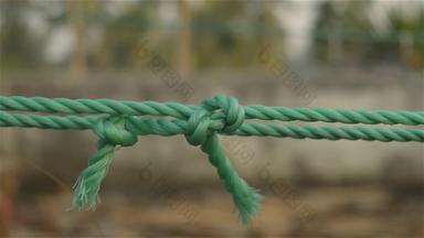 绳子领带结特写镜头绳子系结中间孤立的背景象<strong>征信</strong>任强度安全支持信仰在一起概念说明概念上的镜头