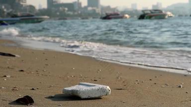 泡沫海滩塑料橡胶浪费左海滩波吹海