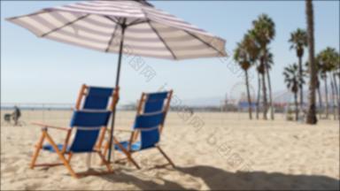 加州海滩散焦空蓝色的甲板椅子条纹伞码头圣诞老人莫妮卡太平洋海洋度假胜地夏季放松休息室做梦大气棕榈树这些洛杉矶美国