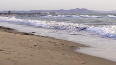 湿海滩沙子传入的海洋波电影自然背景
