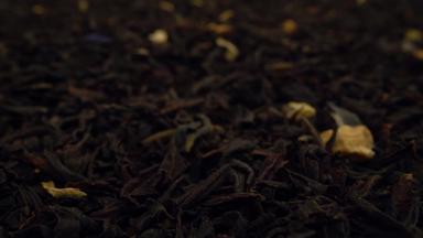 极特写镜头干黑色的茶叶子背景多莉拍摄